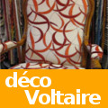 Des fauteuils Voltaire habillés d'imitation cuir et peaux ou  tissus  unis, faux unis, imprimés fleuris, graphiques, rayures ou style Art Déco ... pour des intérieurs chics et raffinés