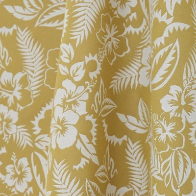 Nooréa tissu ameublement  de Jean Paul Gaultier, motif floral végétal stylisé pour  rideaux, fauteuil et canapé, vendu par la rime des matieres