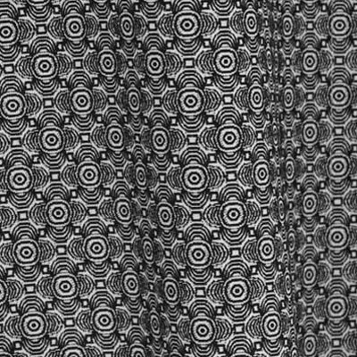 Optic tissu ameublement  de Jean Paul Gaultier, petit motif graphique effet 3D  pour  rideaux, fauteuil et canapé, vendu par la rime des matieres